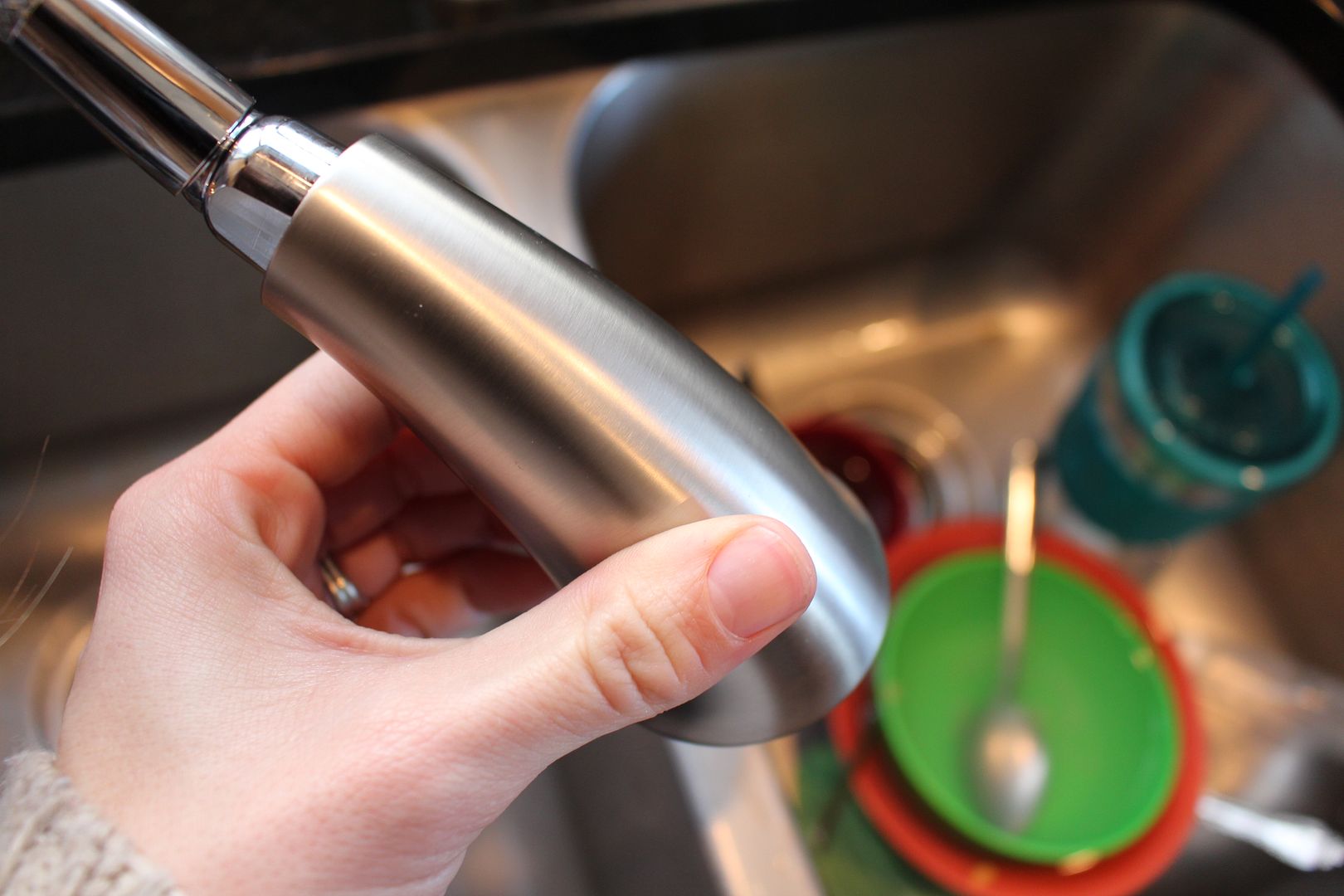 A new Moen faucet! A girl and a glue gun